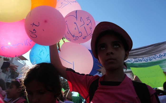 أطفال بغزة يطالبون بحمايتهم من الاحتلال